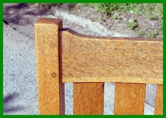 Detail showing double-pinned mortise and tenon construction of the crest rail and top of leg.